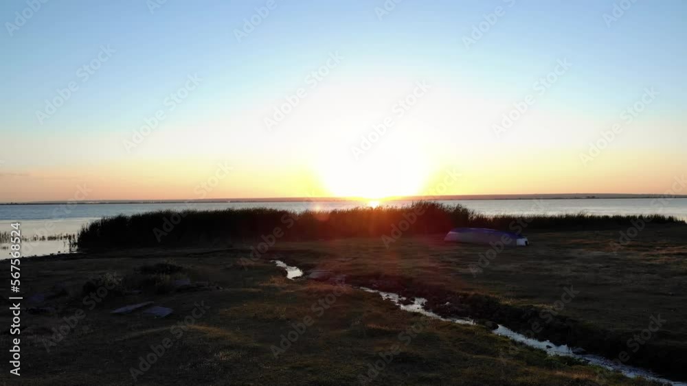 Beautiful Sunrise Over The Calm Waters Of Lake. - aerial forward Beautiful Sunrise Over The Calm Waters Of Lake. - aerial forward