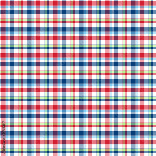 Seamless red and blue, green checkered plaid fabric pattern texture. Stripes crossed horizontal and vertical lines. Seamless checkered picnic pattern 
