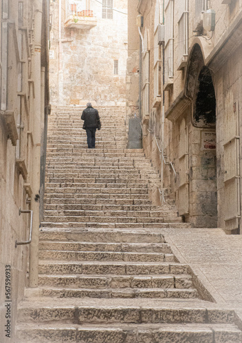 Man Walking up Stairs in Jerusalem