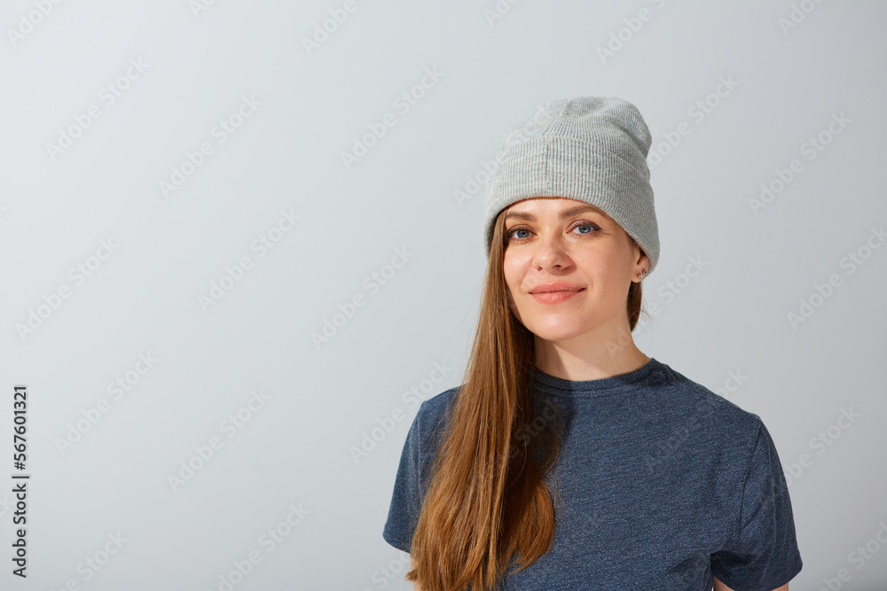 Smiling woman in beanie hat close up face isolated portrait. Smiling woman in beanie hat close up face isolated portrait.