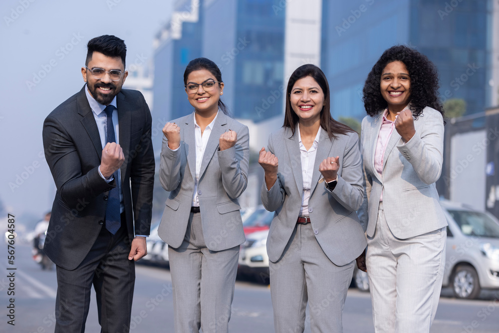 Portrait of happy businesspeople enjoying success Portrait of happy businesspeople enjoying success