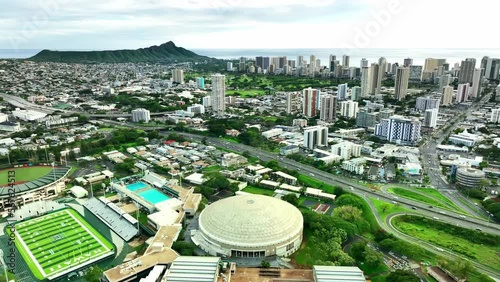 Aerial view Honolulu city skyline. Drone University of Hawaii Manoa campus. Waikiki travel destination in Oahu island, USA. photo