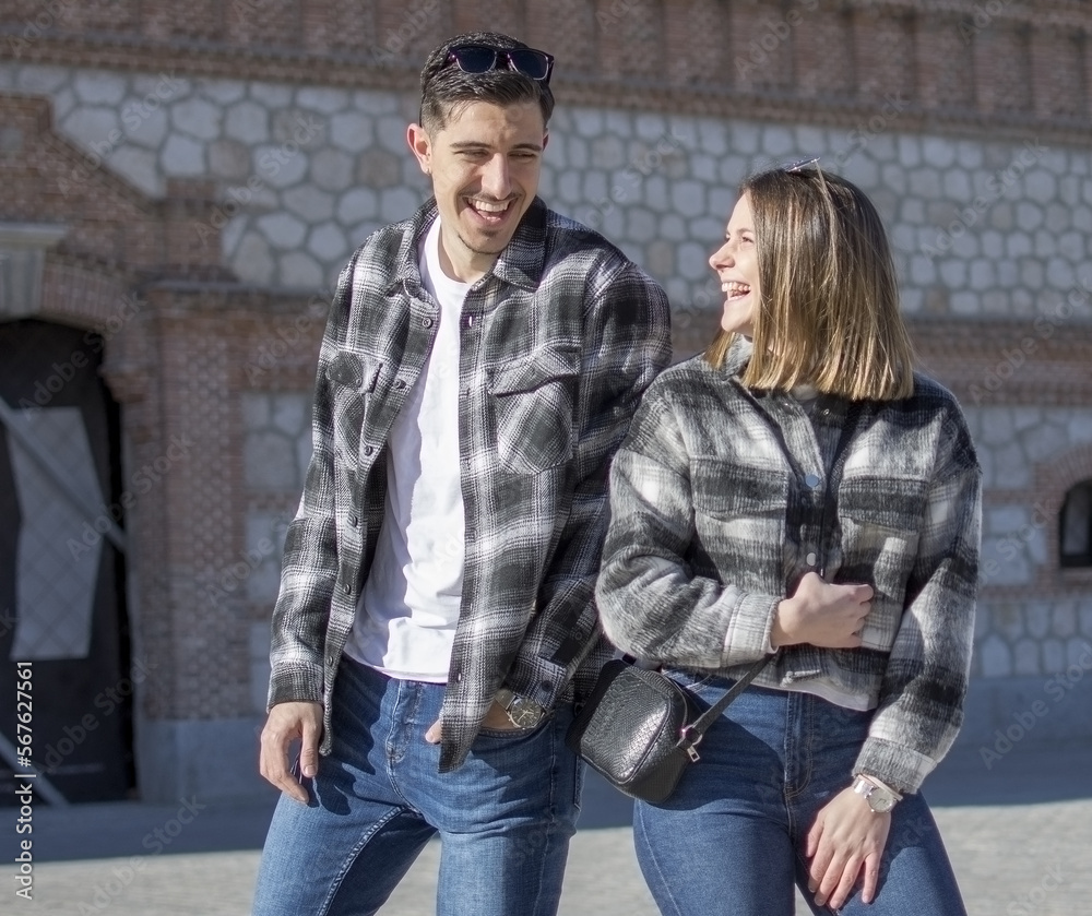 Fototapeta premium A portrait of happy couple having fun outdoors