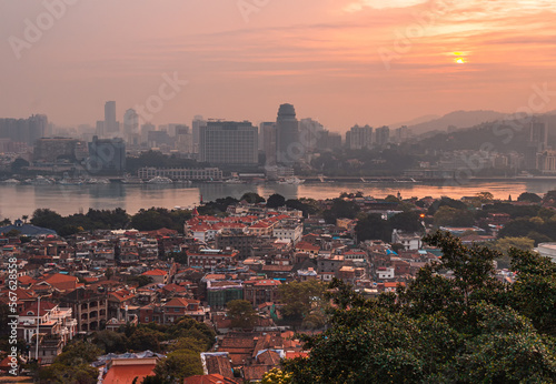 The sunrise of Gulangyu Island and the coast of Xiamen City taken from "Sunlight" rock. © Gavin