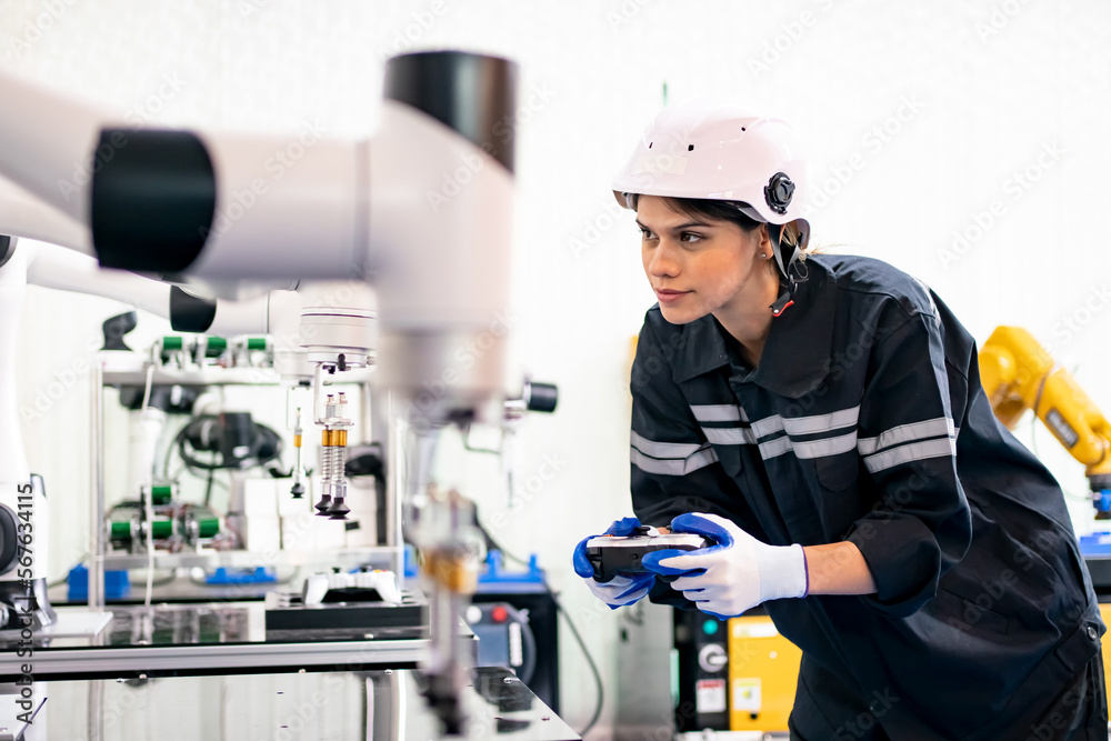 Quality control worker analyzing machine part in laboratory. Quality control worker analyzing machine part in laboratory.