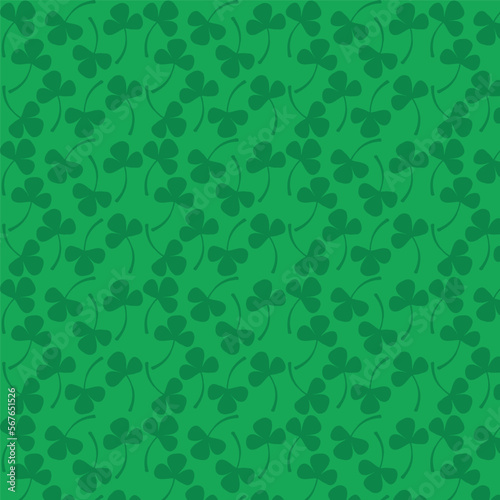 Clover leaves seamless pattern in green colors. Decorative background for wrapping paper, wallpaper, textile, greeting cards and invitations.