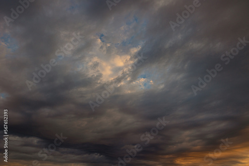 Dramatic sky with clouds at sunset or sunrise. Storm or weather forecast concept