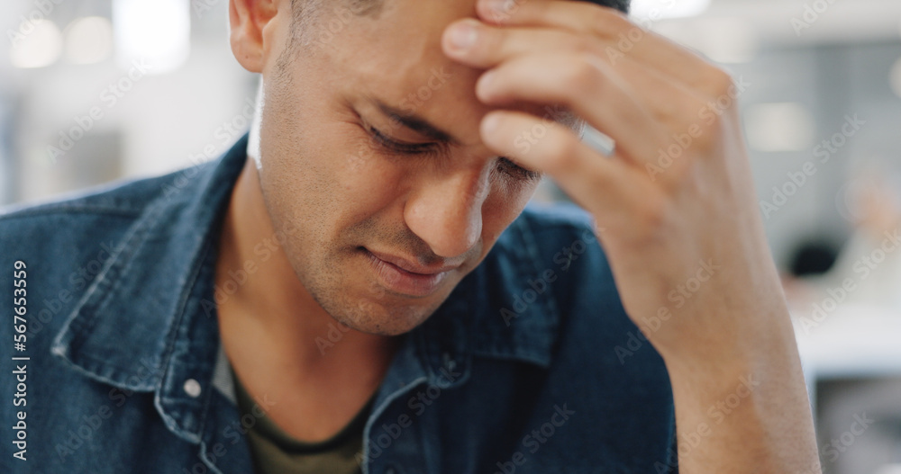 Obraz premium Businessman, stress headache and office for finance, planning or anxiety for target, deadline or kpi. Black man, burnout and mental health in modern office for strategy, thinking or exhausted at work