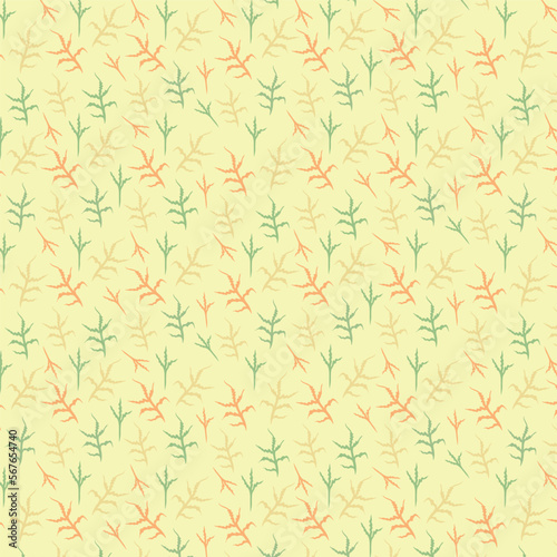 Yellow background with multicolored leaves. Decorative seamless pattern for wrapping paper, wallpaper, textile, greeting cards and invitations.