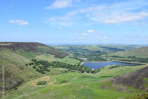 Wallpaper Mural Countryside view with green hills and mountains with a lake in distance. Taken in Oldham England.  Torontodigital.ca