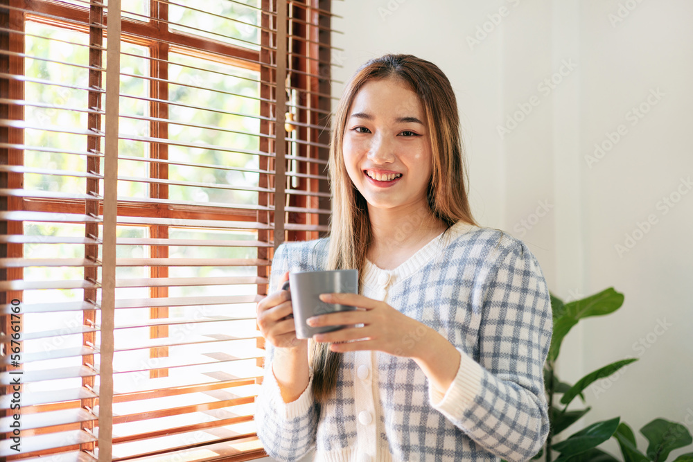Woman drinking hot chocolate to enjoying dreamy and relaxing wit Woman drinking hot chocolate to enjoying dreamy and relaxing wit