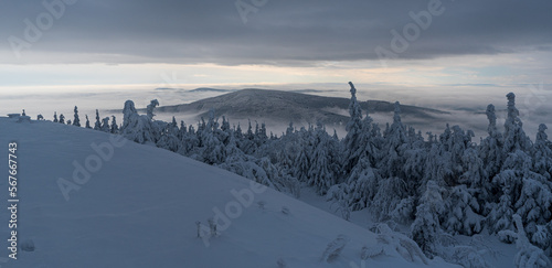 Travny from Lysa hora hill in winter Moravskosezske Beskydy mountains in Czech republic photo