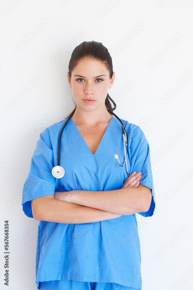 Portrait, woman and doctor with arms crossed standing isolated against a white studio background. Confident female medical professional, expert or nurse with stethoscope for healthcare or profile Portrait, woman and doctor with arms crossed standing isolated against a white studio background. Confident female medical professional, expert or nurse with stethoscope for healthcare or profile