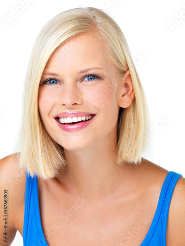Happy, smile and portrait of a woman in a studio with happy, optimistic and positive mindset. Happiness, excited and face of female model from Australia with blonde hair isolated by white background.