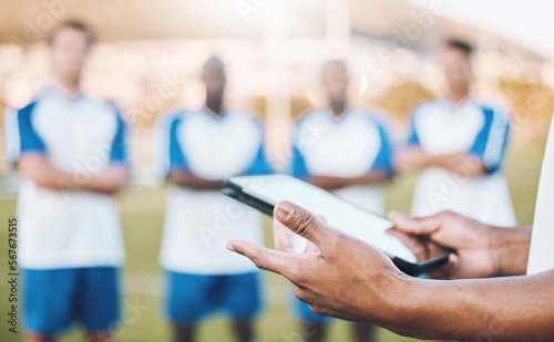 Football, soccer and team statistics on a tablet and coach analysis online, internet or website on a sports field. Teamwork, digital and tactics by modern trainer tracking performance analytics