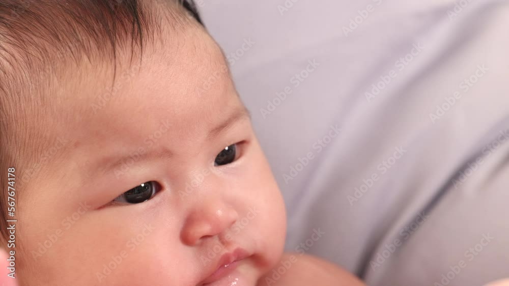 Closeup Asian newborn baby lying prone on beige soft bed. adorable infant without clothes looking for mom want to play with mother while she work, baby feel hungry want milk. healthy toddler.
Closeup Asian newborn baby lying prone on beige soft bed. adorable infant without clothes looking for mom want to play with mother while she work, baby feel hungry want milk. healthy toddler.