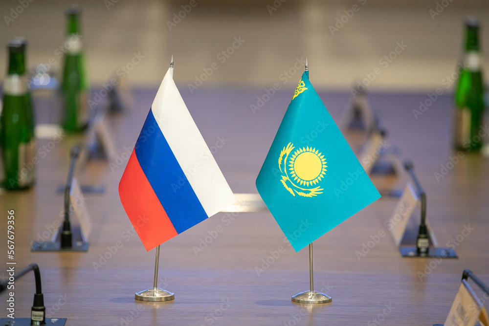 Flags of cooperation between Russia and Kazakhstan. Close-up.