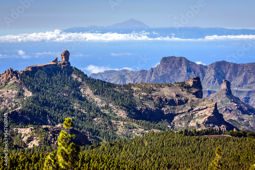 Magestic view from El Pico de las Nieves viewpoint of Roque Nublo and Teide peak at Roque Nublo Rural Park, Gran Canary, Canary Islands, Spain photo