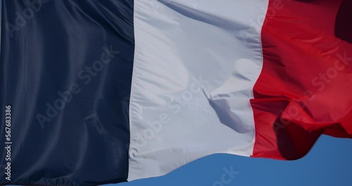 The french national flag waving in the wind. photo