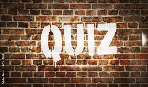 Quiz spray painted on the brick wall illustration
