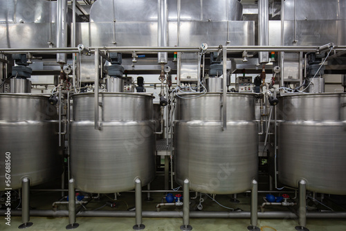 Modern coconut milk cellar with stainless steel tanks photo
