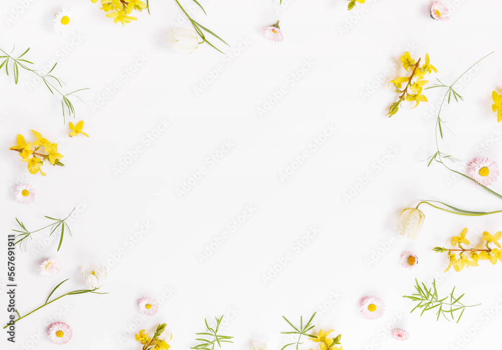 Floral pattern with wildflowers, green leaves, branch on white background. Flat lay Floral pattern with wildflowers, green leaves, branch on white background. Flat lay