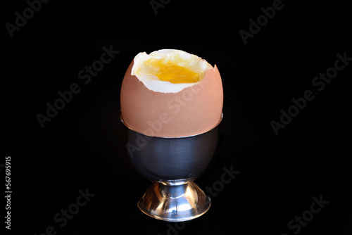 Fotografie boiled egg opened and placed in an egg cup