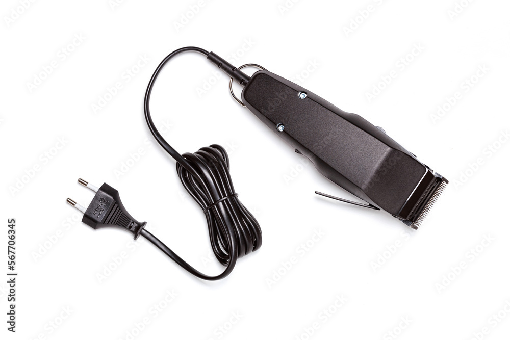 Professional hair clipper isolated on white background. Top view of the electric black hair clipper, closeup Professional hair clipper isolated on white background. Top view of the electric black hair clipper, closeup