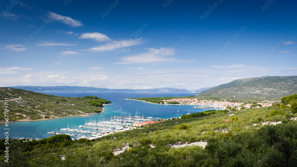 View over bay and city of Cres with Kvarner Gulf Bay on sunny day | island of Cres, Croatia