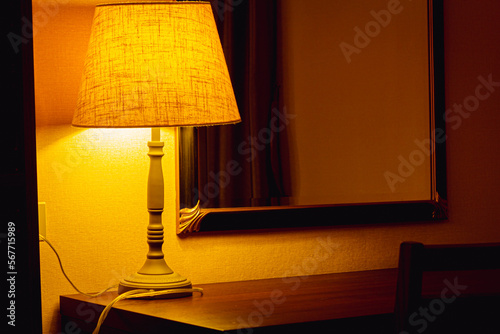 Принти на полотні A close up shot of a dimly lit lamp shade in a hotel room