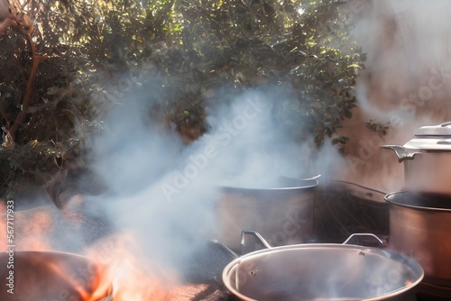 Soft focus The smoke from the cooking pot and sun light - generative ai