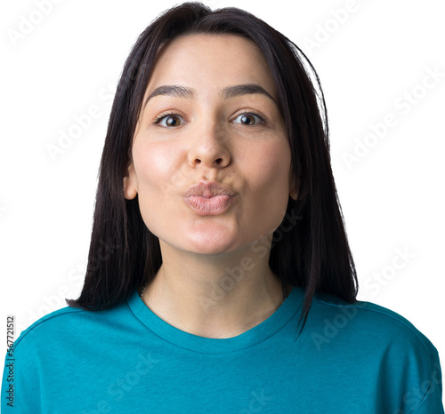 Portrait of flirting young woman blowing air kiss isolated over grey background