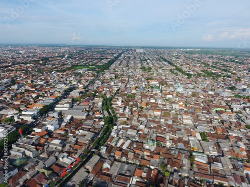 An aerial photo depicting a dense residential area in the city of Surabaya, Indonesia