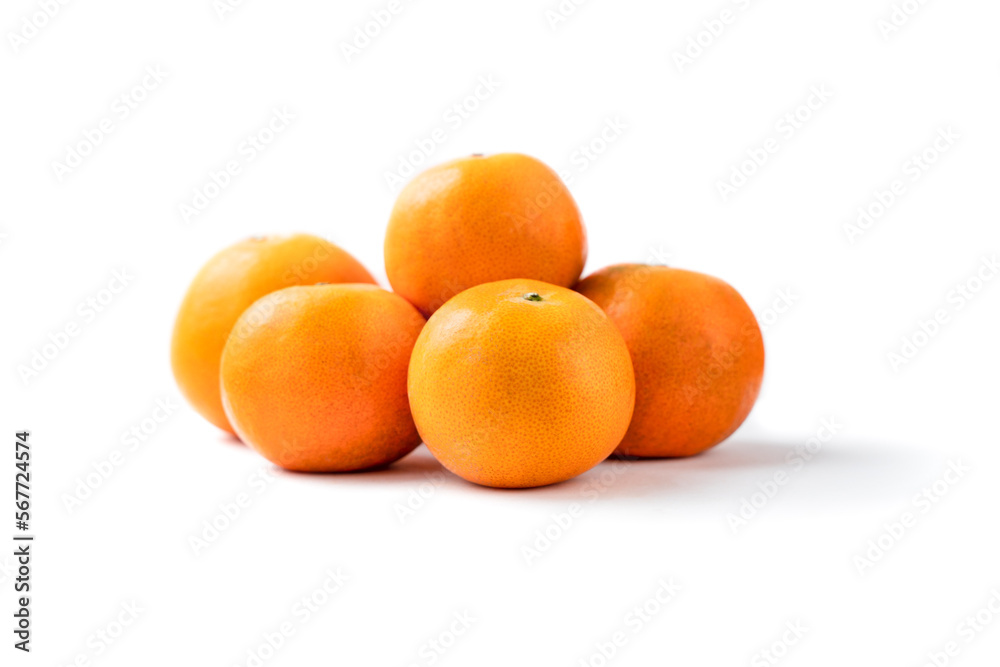 Closeup pile of fresh organic orange fruit on white background. Closeup pile of fresh organic orange fruit on white background.