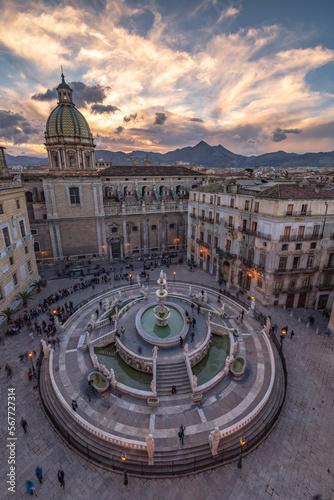 Pretoria square and fountain seen from above at dusk, city of Palermo IT