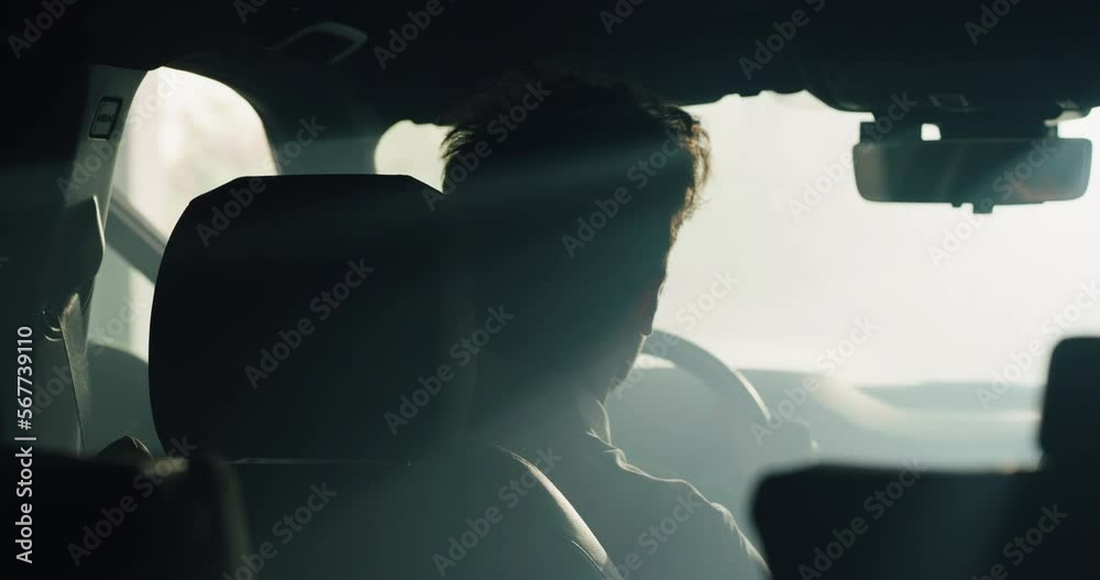 Aesthetic Back View Shot of a Young Man Getting Inside his Car in the Morning and Getting Ready to Leave the Garage. Morning Routine of a Male Employee Starting his Day and Heading to Work