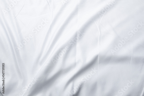Fototapeta Naklejka Na Ścianę i Meble -  white bed linen gradient texture blurred curve style of abstract luxury fabric,Wrinkled bed linen and dark gray shadows,background