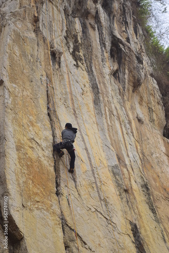 Rock climbing at Gunung Hawu Mountain cliff, Bandung, West Java Indonesia
