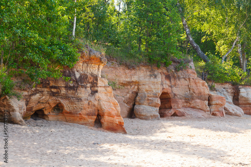 Veczemju klintis (Veczemju cliffs) on Baltic sea near Tuja, Latvia in summer season. Beautiful sea shore with limestone and sand caves