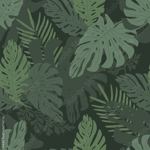 Seamless pattern deep green flat tropical leaves