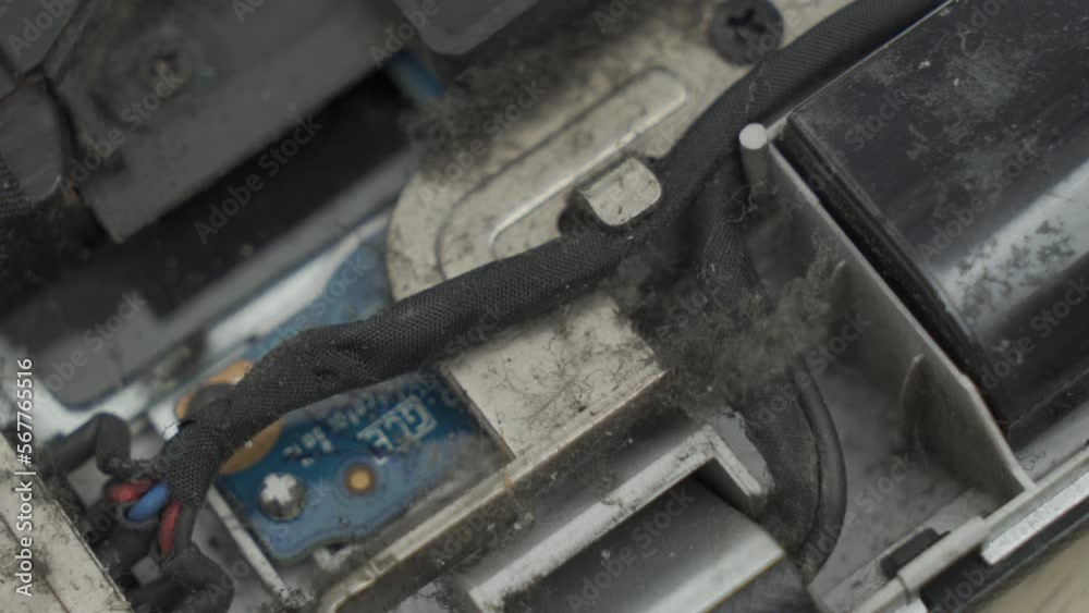macro shot taken while performing maintenance on the laptop cooling system. Concept for laptop device repair. macro shot taken while performing maintenance on the laptop cooling system. Concept for laptop device repair.