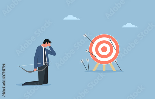 Business challenge failure metaphor, multiple failed inaccurate attempts to hit archery target, despair or disappointment from losing opportunity photo