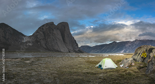 Tent on arctic valley of Akshayuk Pass, Baffin Island, Canada