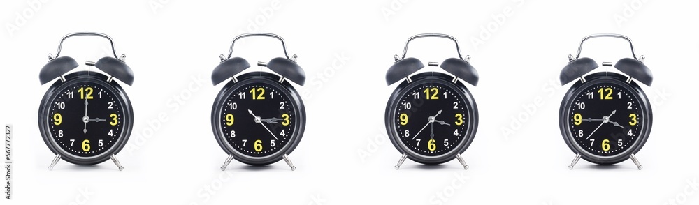 close up of a set of black alarm clocks showing the time; 3, 3.15, 3.30 and 3.45 p.m or a.m. Isolated on white background - obrazy, fototapety, plakaty 