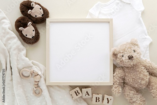 Fotografiet Wooden square frame mockup, blank frame for pregnancy announcement design, baby name sign, nursery art presentation