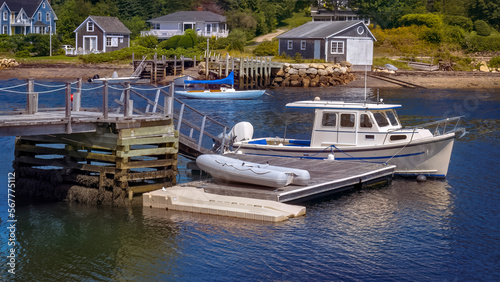Boat Docked in at a harbor's wharf  in rural Nova Scotia's coast.