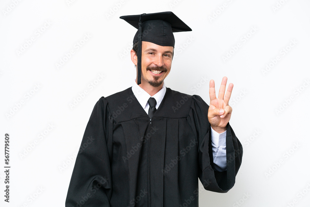 Young university graduate man isolated on white background happy and counting three with fingers Young university graduate man isolated on white background happy and counting three with fingers