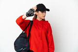 Young sport woman with sport bag isolated on white background making stop gesture and disappointed