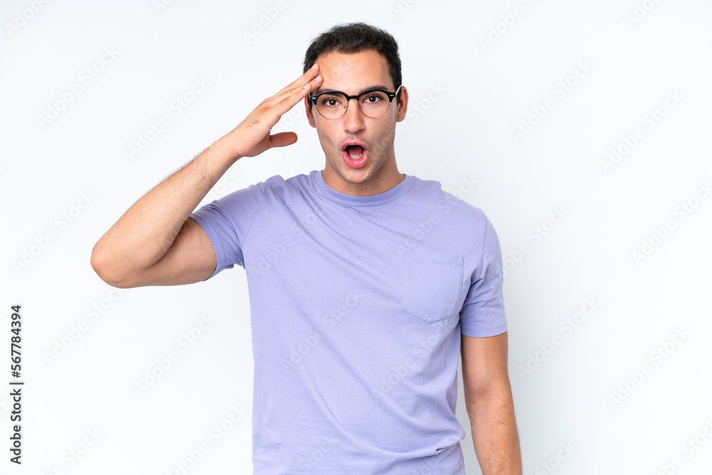 Young caucasian man isolated on white background has realized something and intending the solution Young caucasian man isolated on white background has realized something and intending the solution