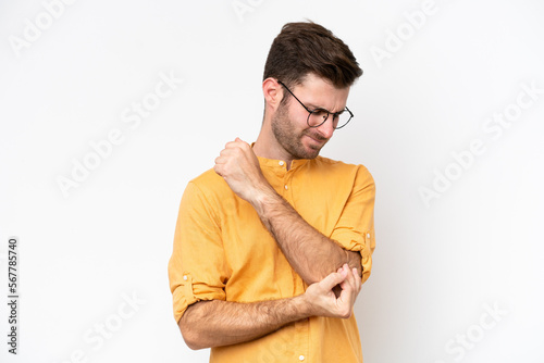 Young caucasian man isolated on white background with pain in elbow